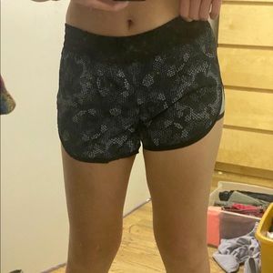 champion patterned black athletic shorts